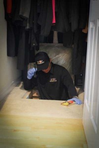 Our exterminator technician going into a crawlspace for a pest control inspection.